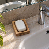porte savon en bambou dans la salle de bain